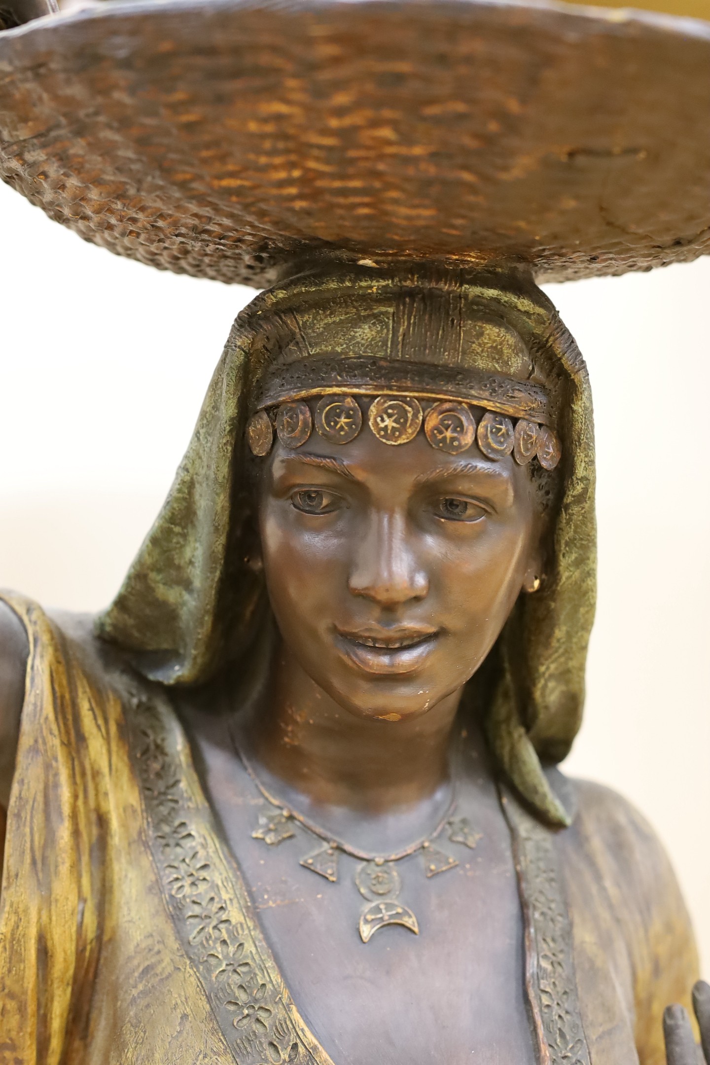 A large Goldscheider Nubian woman figural centrepiece, height 74cm